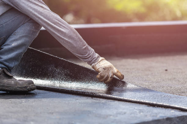 Professional Waterproofing technician working in Hart, MI